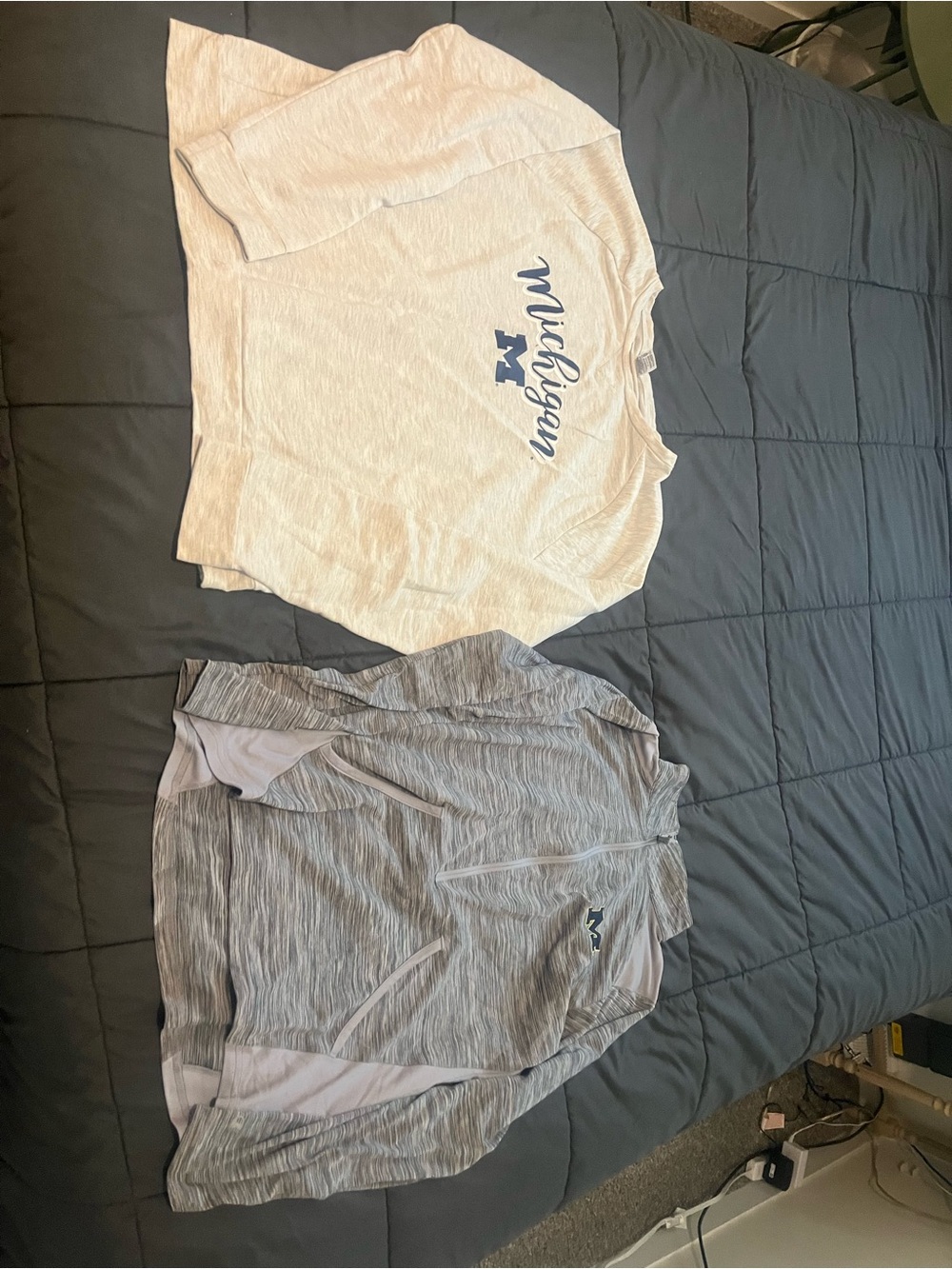 Lot of 2 womens u of Michigan tops. Both lightweight. Sized XL but fit M/L